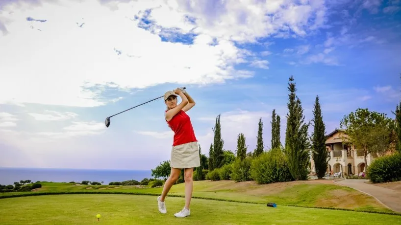 Aphrodite hills lady playing golf