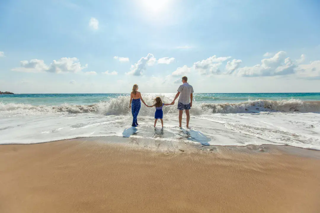 young family on beach